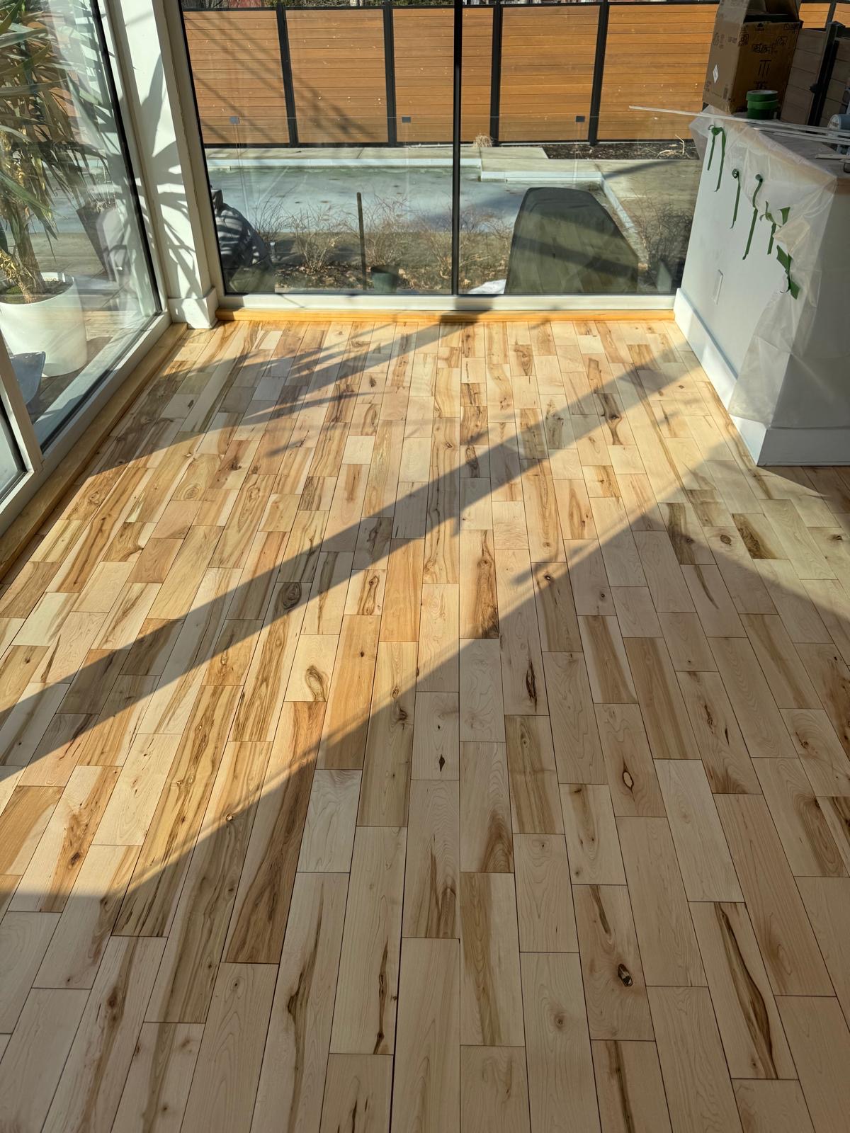 Plancher naturel lumineux restauré par Sablage Grande Ville
